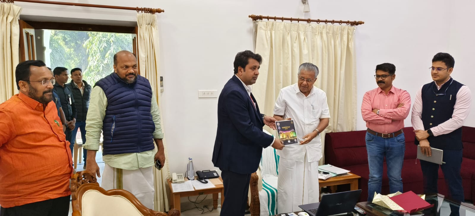 Chief Minister Pinarayi Vijayan  releases   Travancore Palace Brochure